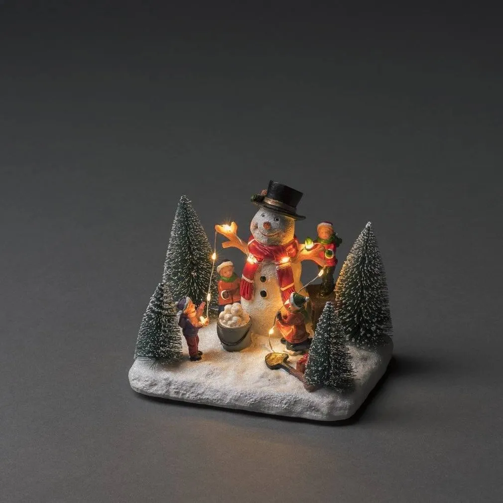 JÕULUKUJU KONSTSMIDE LUMEMEMM KUUSEPUUGA 11,5X16,5X13CM