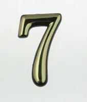 KORTERINUMBER 7 MESSING/PLASTIK