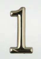 KORTERINUMBER 1 MESSING/PLASTIK